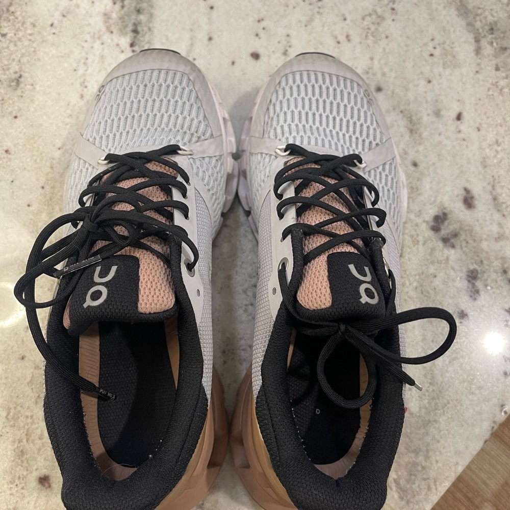 On Running Gray and Pink Athletic Shoes for Performance